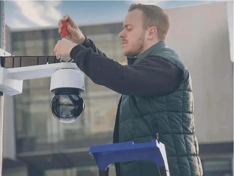 BTI-camera-technican-installing-cameras