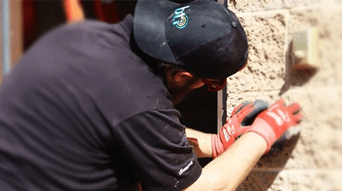 BTI technician installing CCTV & door access control in Los Angeles Califorina