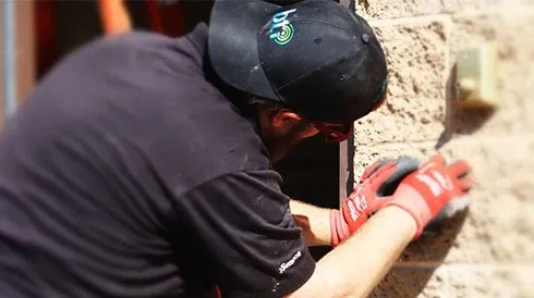 BTI technician installing CCTV & door access control in Los Angeles Califorina