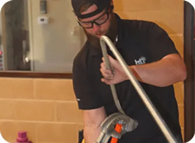 Commercial Security 18 BTI Technician installing conduit