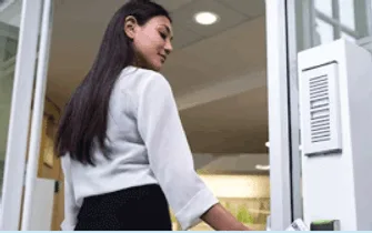 Women using healthcare access control solution to access a hospital