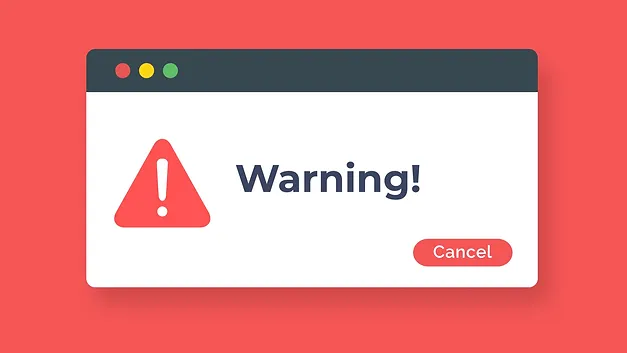 Warning pop-up of a computer on a red background.