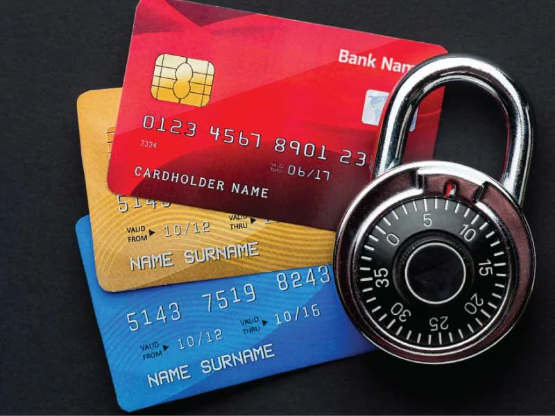 flat lay credit cards with-lock representing card safety and PCI compliance.