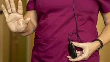 Nurse-pressing-panic-button