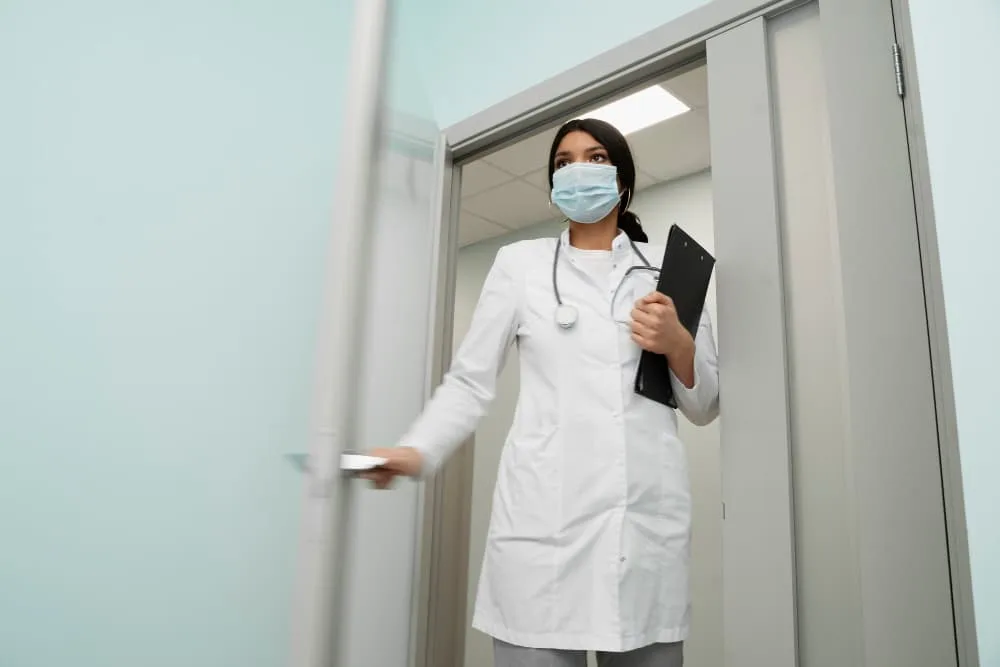 Medial-Professional-using-healthcare-biomtetris-to-access-room