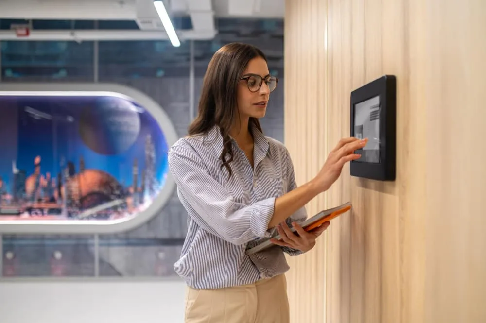 Women-Setting-up-commercial-alarm-system